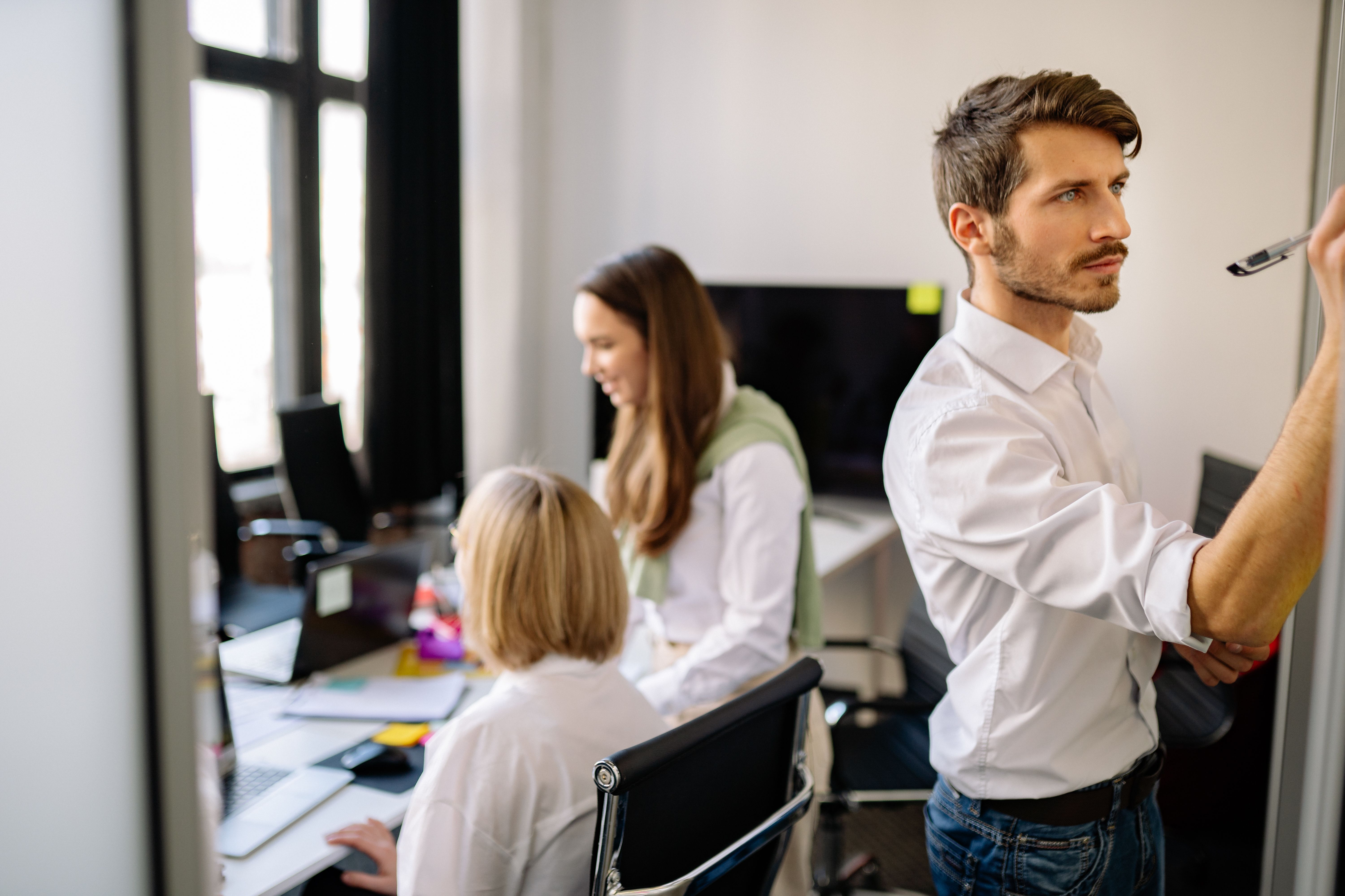 A focused team working together in a modern office